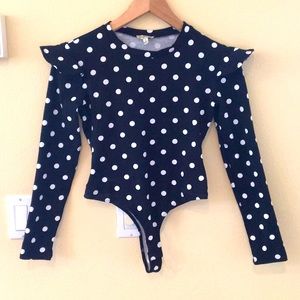 Francesca’s Long sleeved bodysuit top